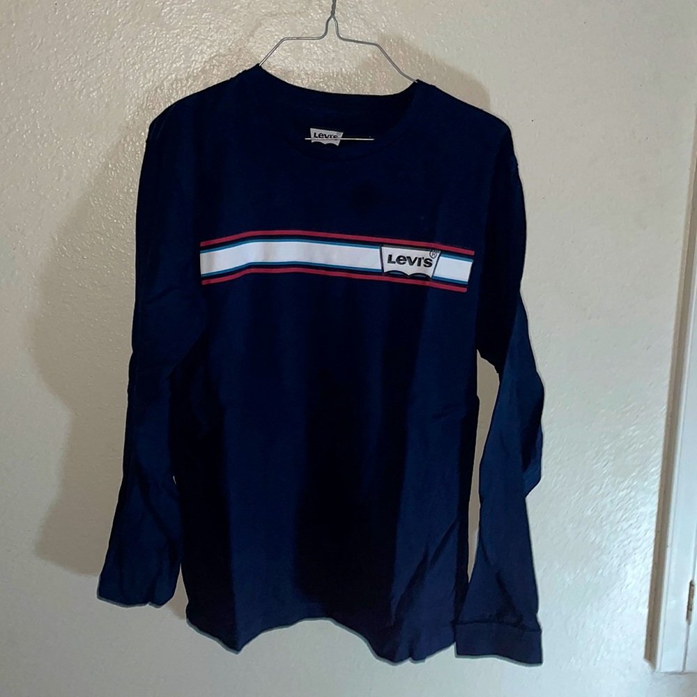 A dark blue Levi long sleeve shirt